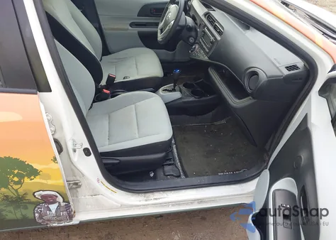 2014 Toyota Prius C One z USA, uszkodzony, nr VIN JTDKDTB37E1569922